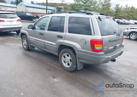 1999 Jeep Grand Cherokee Laredo из США, поврежденный, VIN 1J4GW58S1XC673530